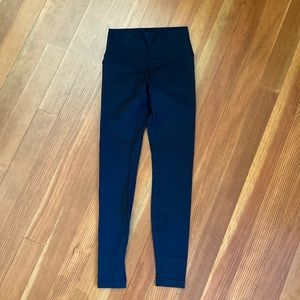 Lululemon black WonderTrain (thicker fabric).